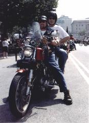 Rep. Readshaw dons a helmet as motorcycle driver Rev. Dr. David Landis of the Word of Grace Ministries Church in suburban Harrisburg prepares to pull out at the lead of the Harrisburg-to-Gettysburg procession.