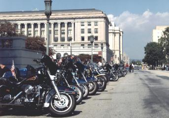 Motorcycles parade past the Pennsylvania Capitol en route to Gettysburg.